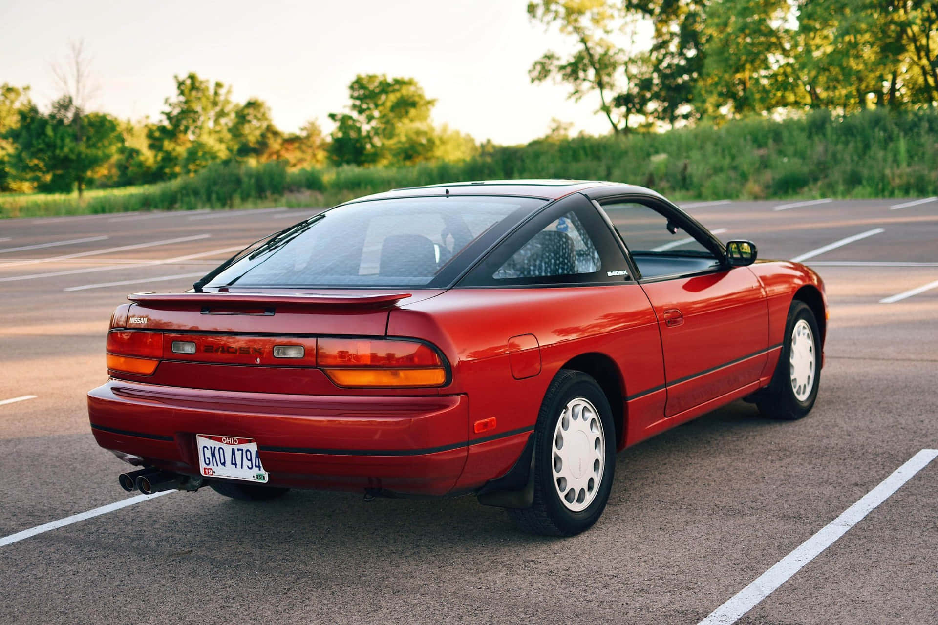 Red Nissan240sx Parked Outdoors Background