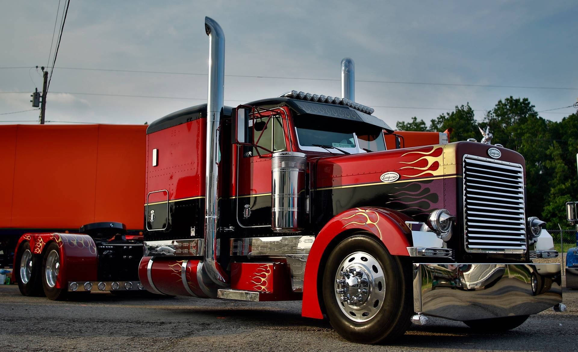 Red Peterbilt With Flame Prints Background