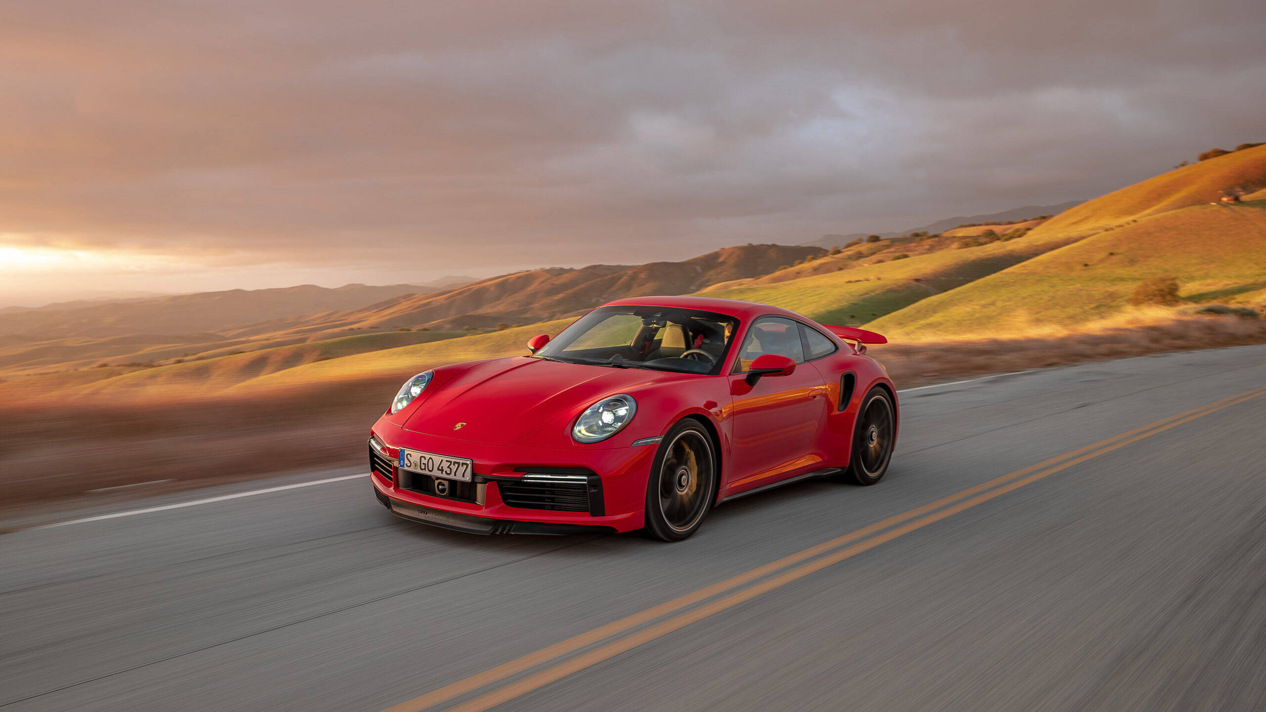 Red Porsche 911 In Empty Road Background