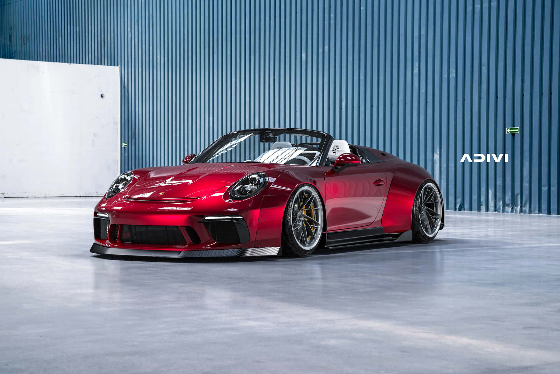Red Porsche Convertible Industrial Backdrop Background