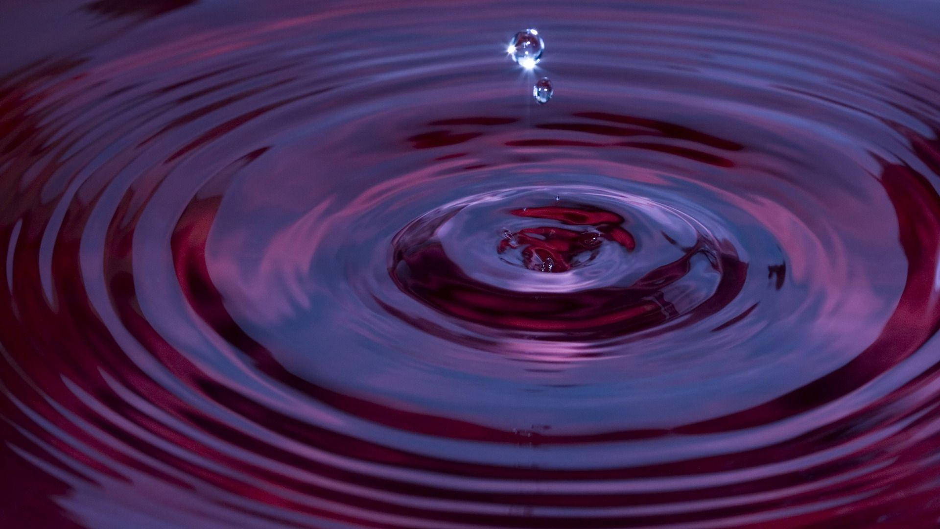 Red Rippling Liquid Background