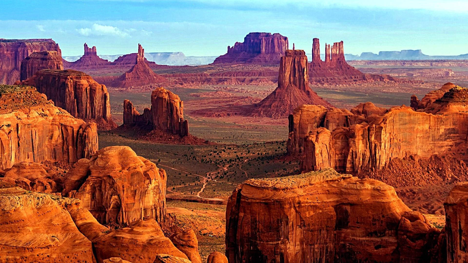 Red Rock Formations At Monument Valley Background