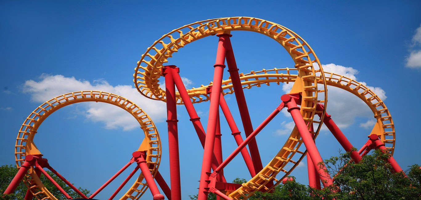 Red Roller Coaster Under The Sky Background