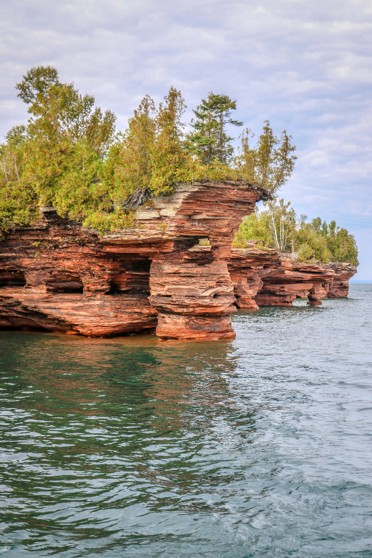 Red_ Sandstone_ Cliffs_ Lake_ Superior Background