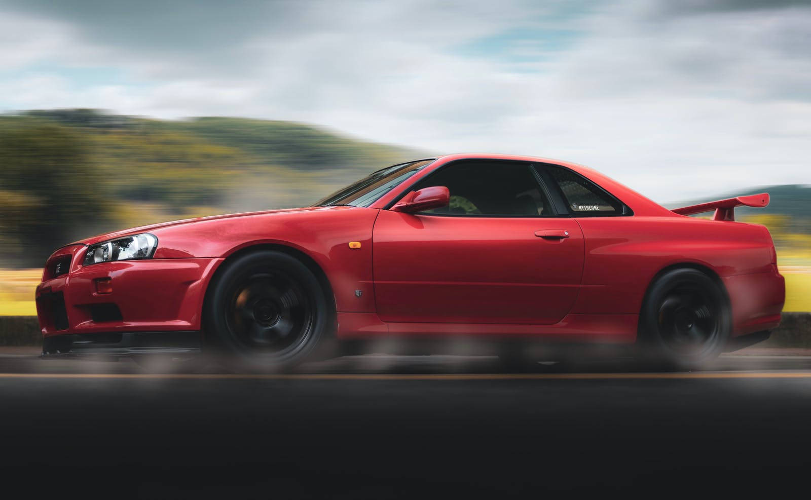 Red Skyline Car Speeding Background