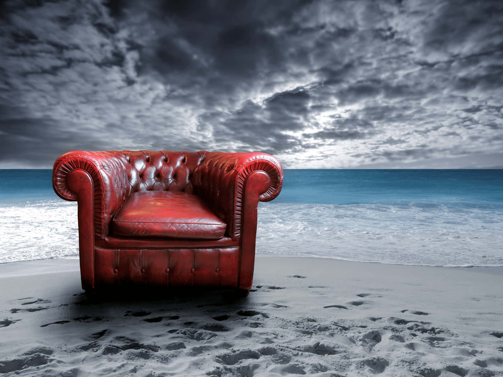 Red Sofa Chair On The Beach Background