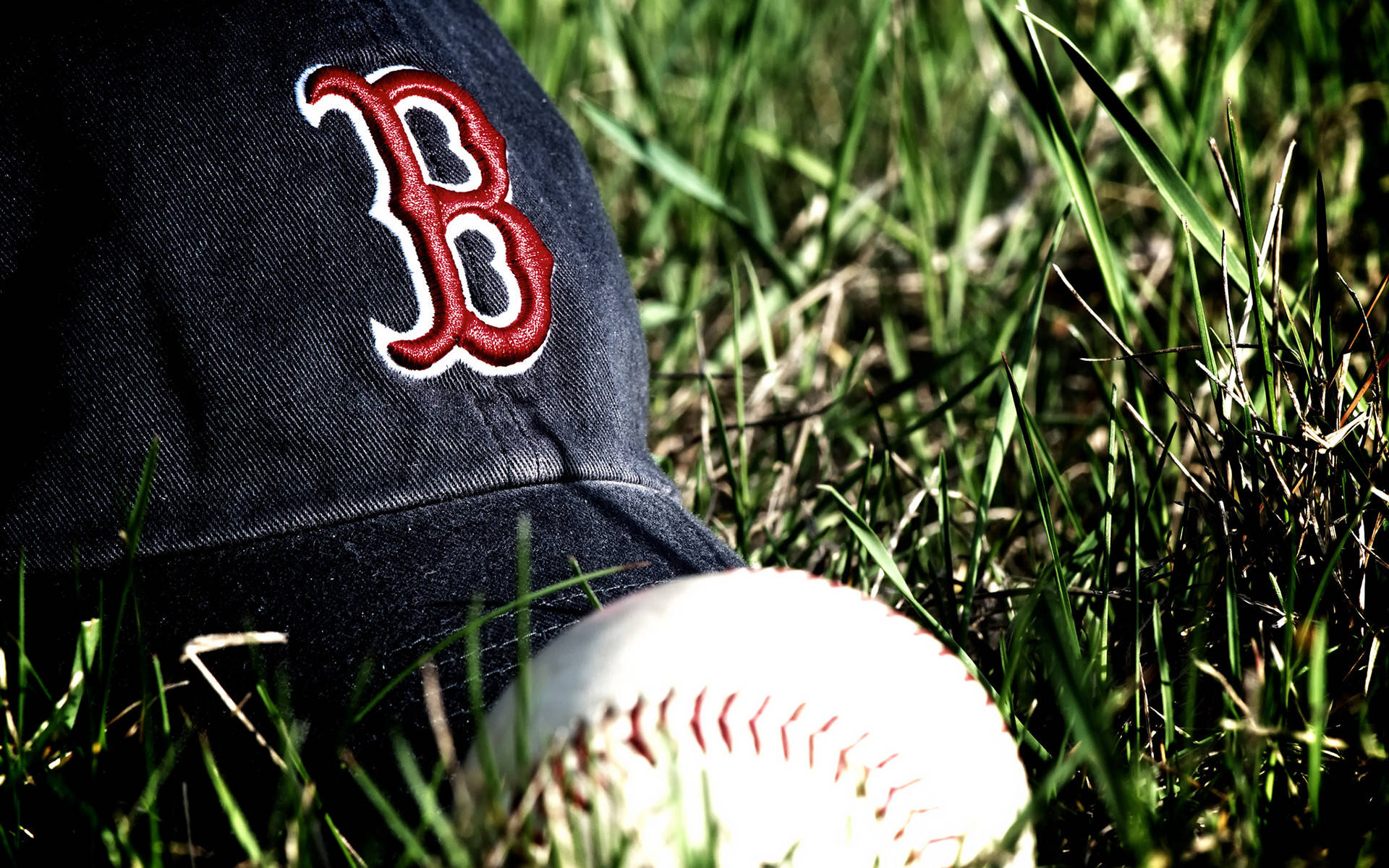 Red Sox Baseball Hat On Grass