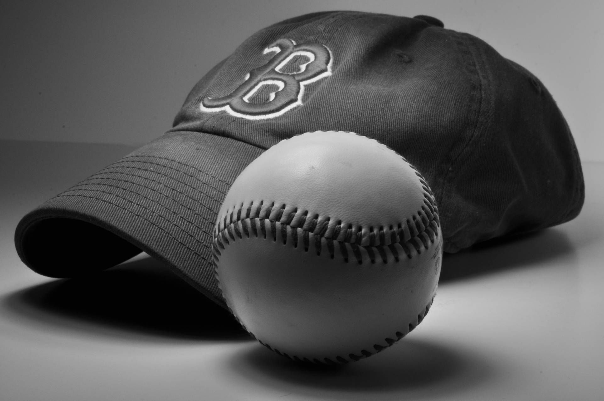 Red Sox Cap And Baseball Background