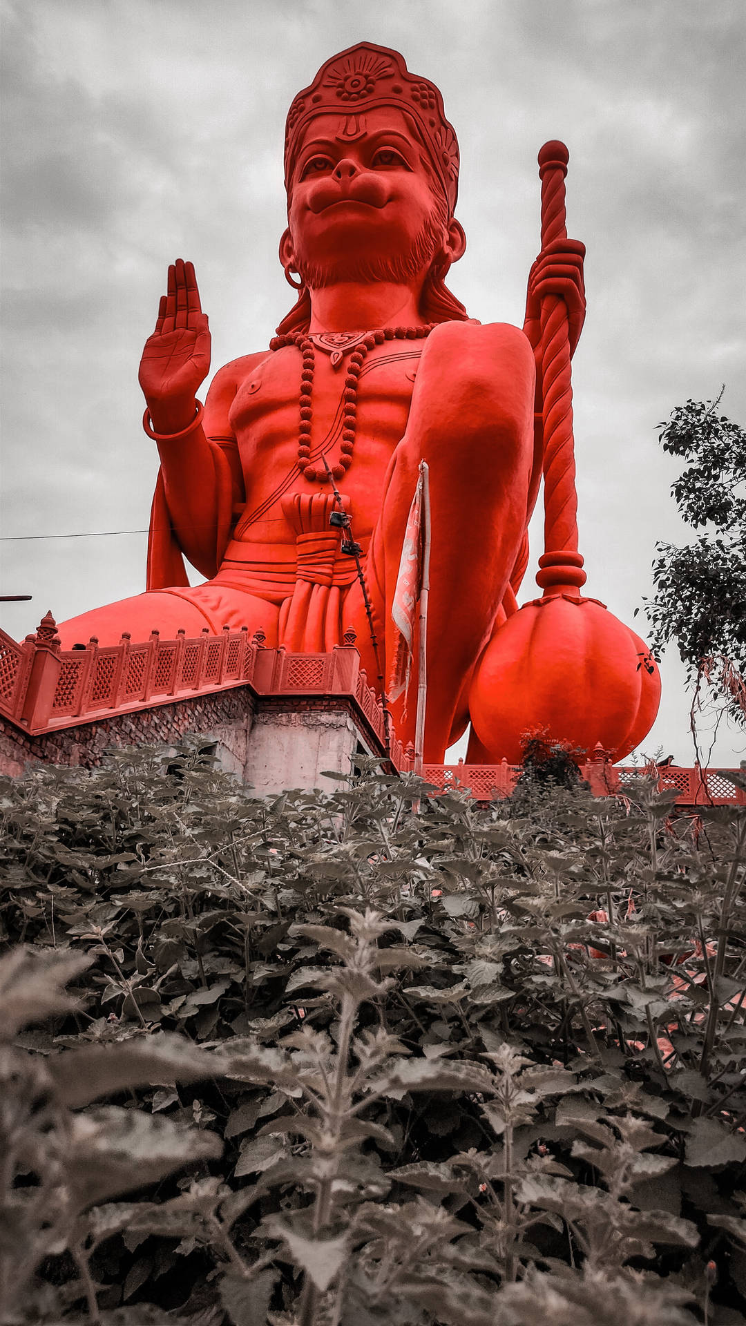 Red Statue Of God Hanuman Background