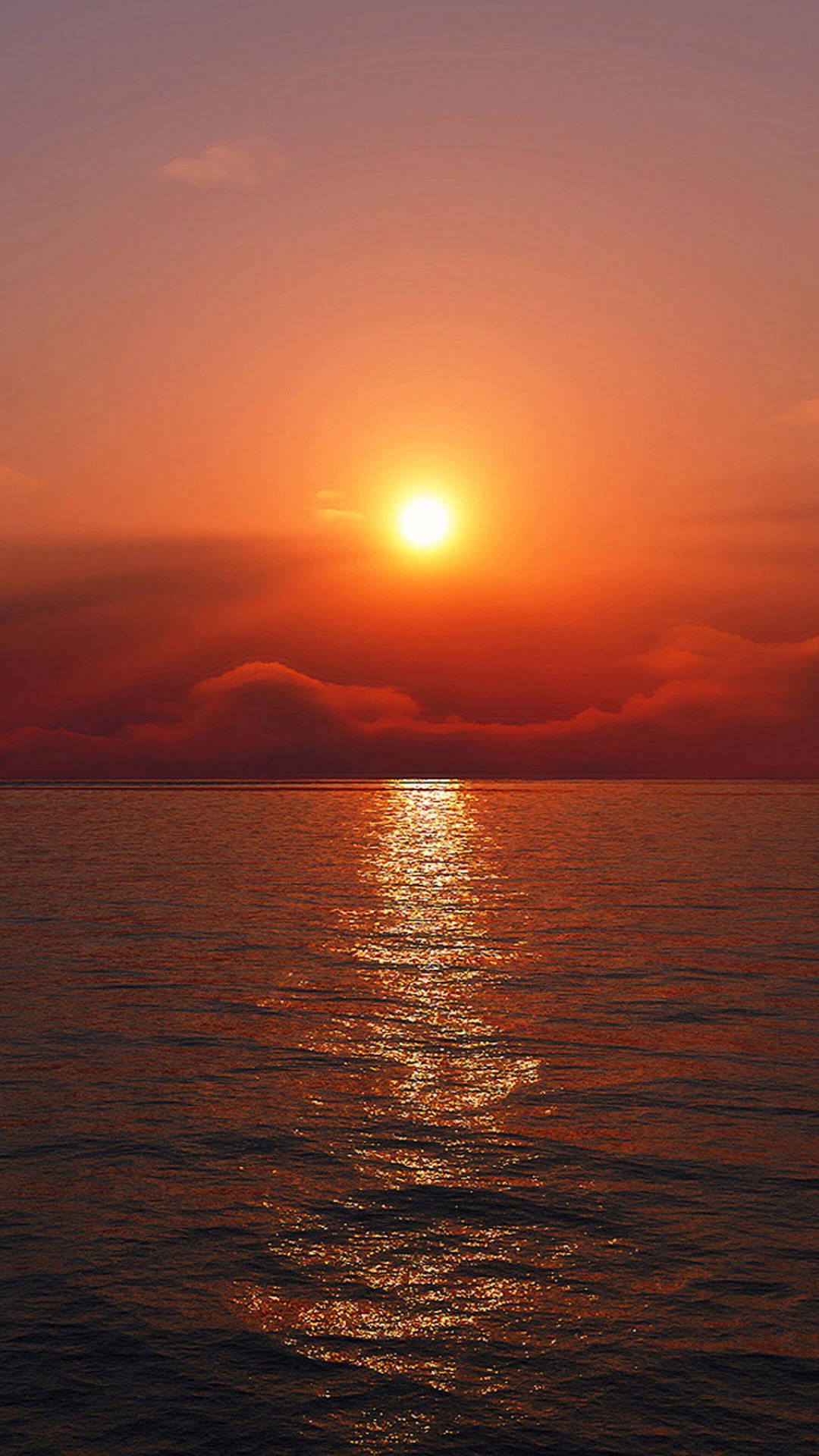 Red Sunset Sky Above Quiet Ocean