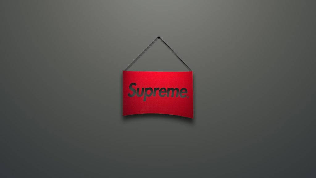 Red Supreme Logo On Gray Background