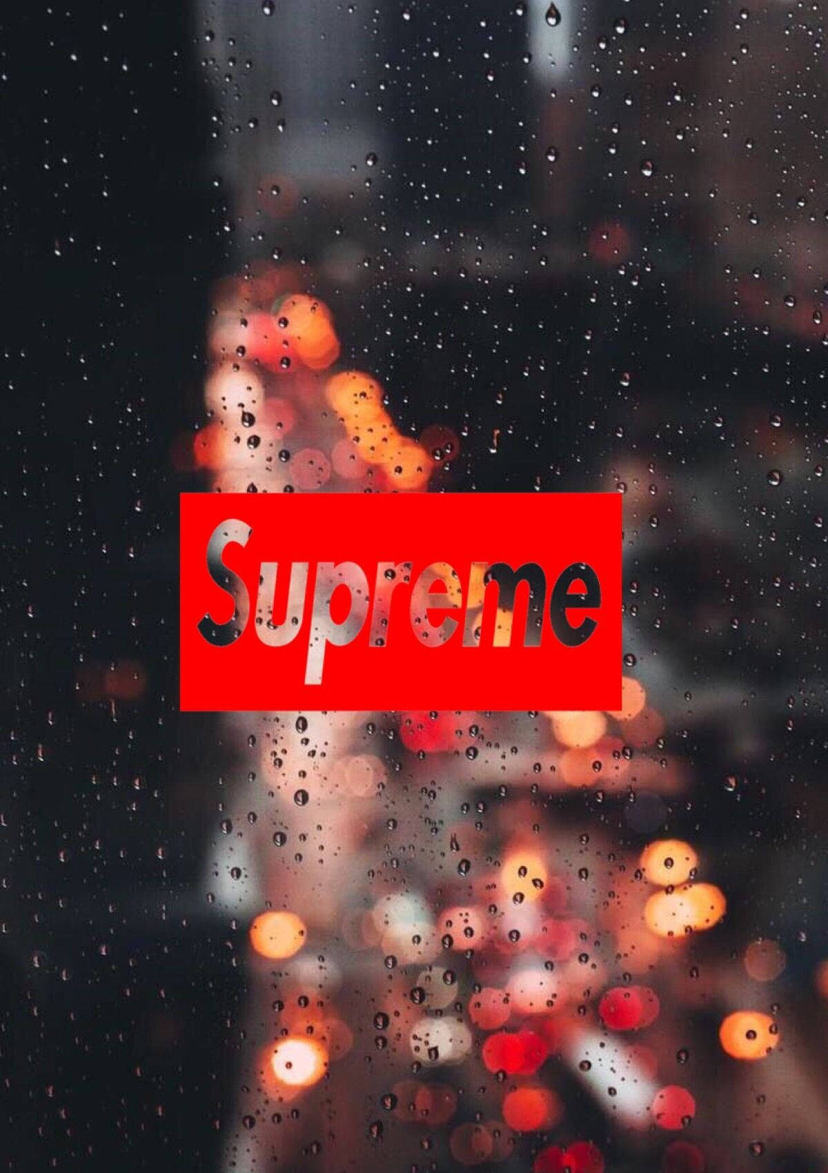 Red Supreme Logo On Rainy Window