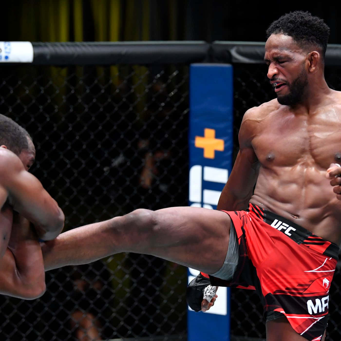 Red Trousers Neil Magny Background