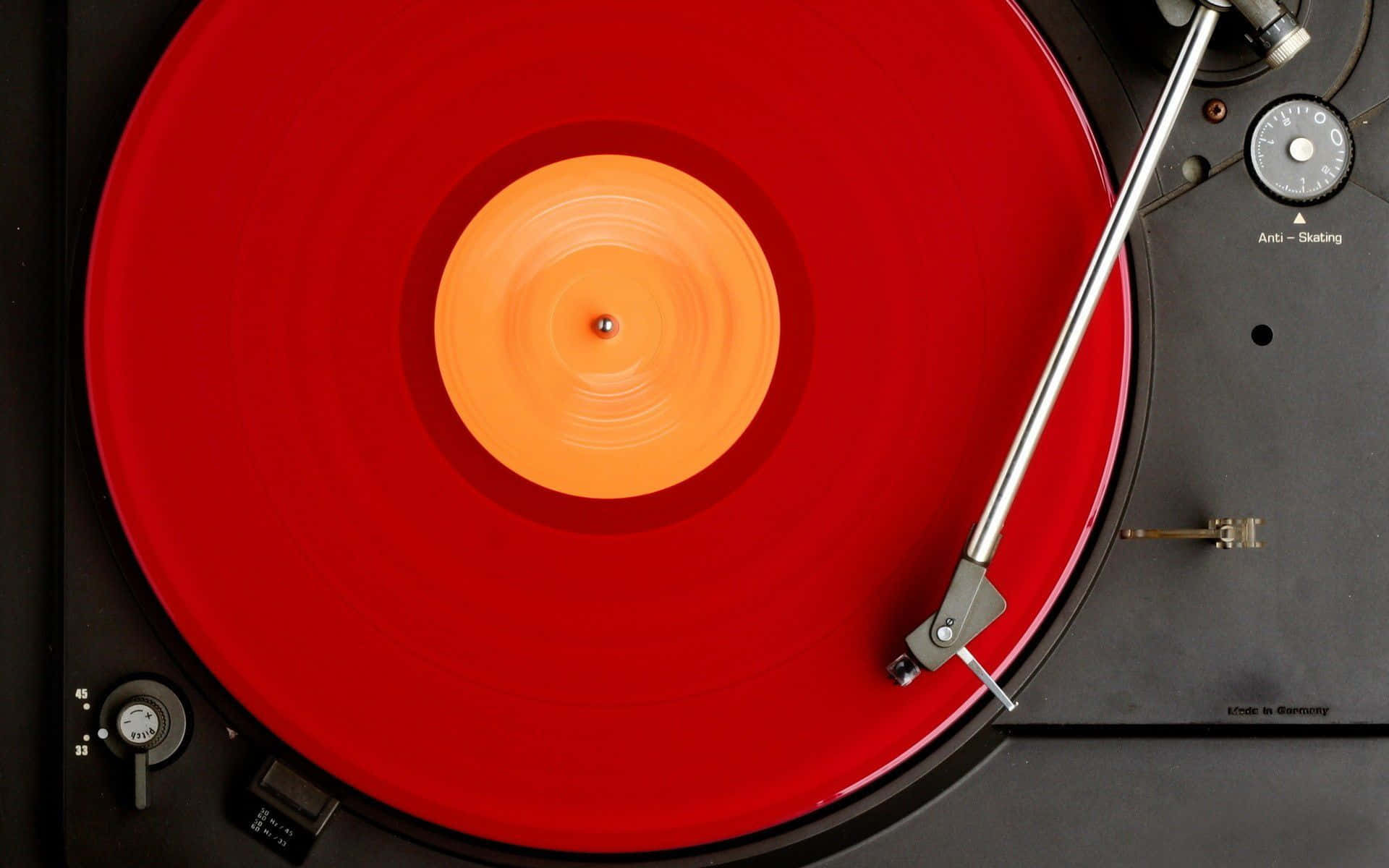 Red Vinyl Record Playing