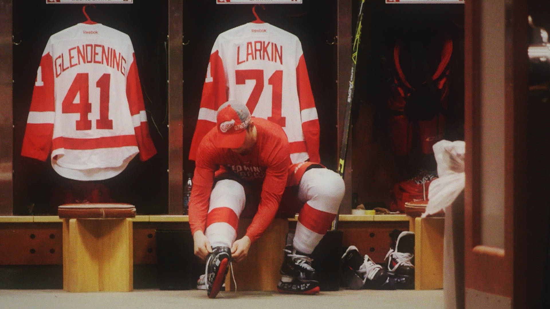 Red Wings Jersey Luke Glendening And Dylan Larkin Background