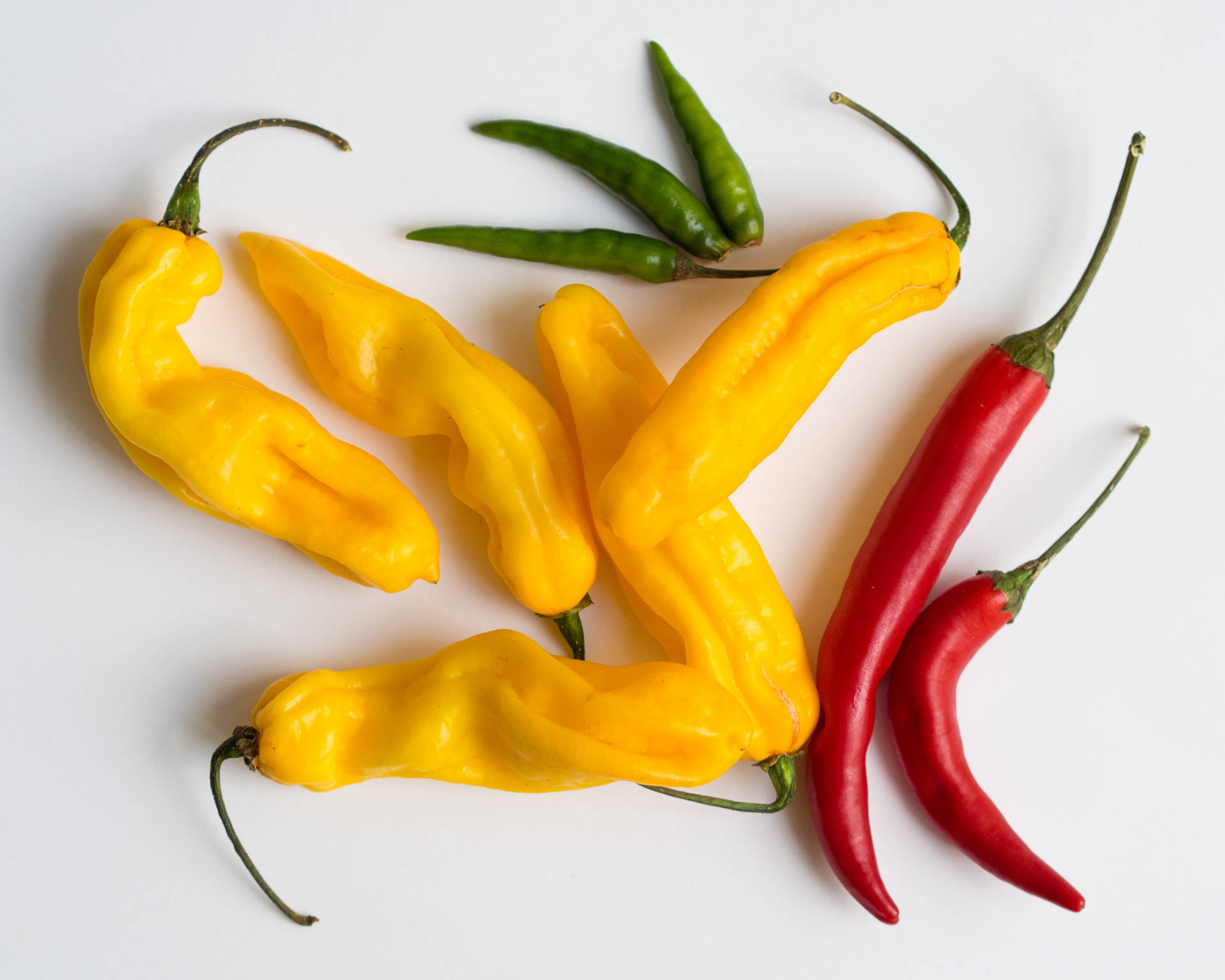 Red Yellow And Green Chili Pepper Fruits