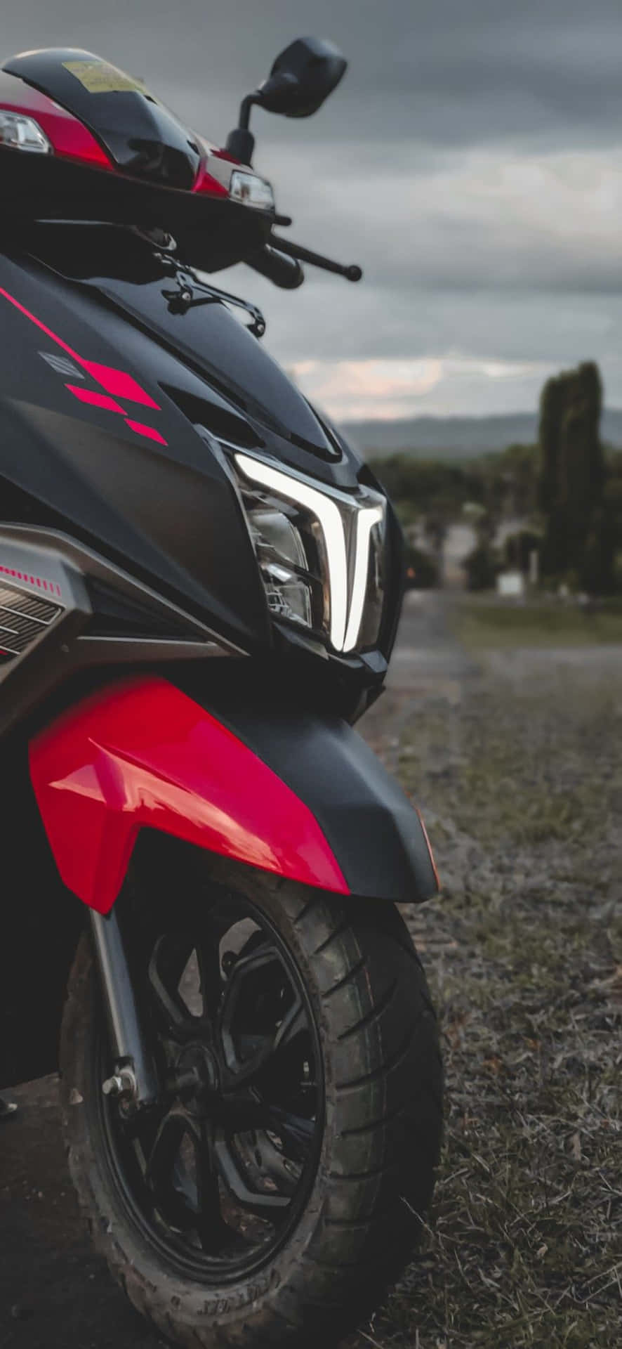 Redand Black Scooter Closeup Background