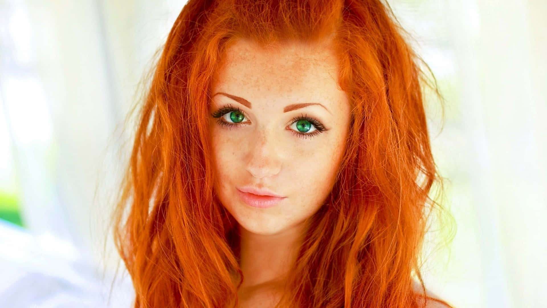 Redhead Girl With Green Eyes