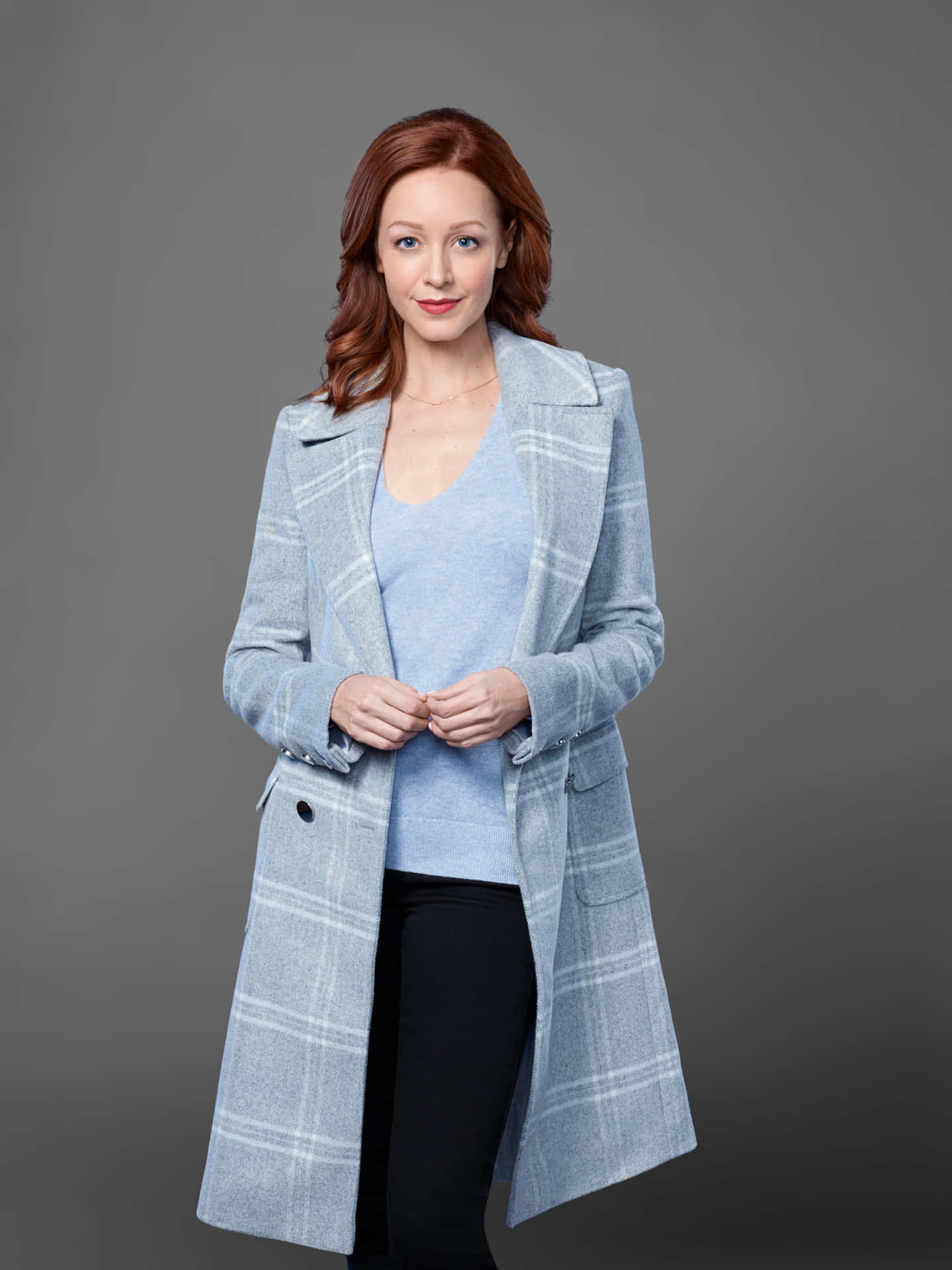 Redheaded Womanin Blue Coat Background