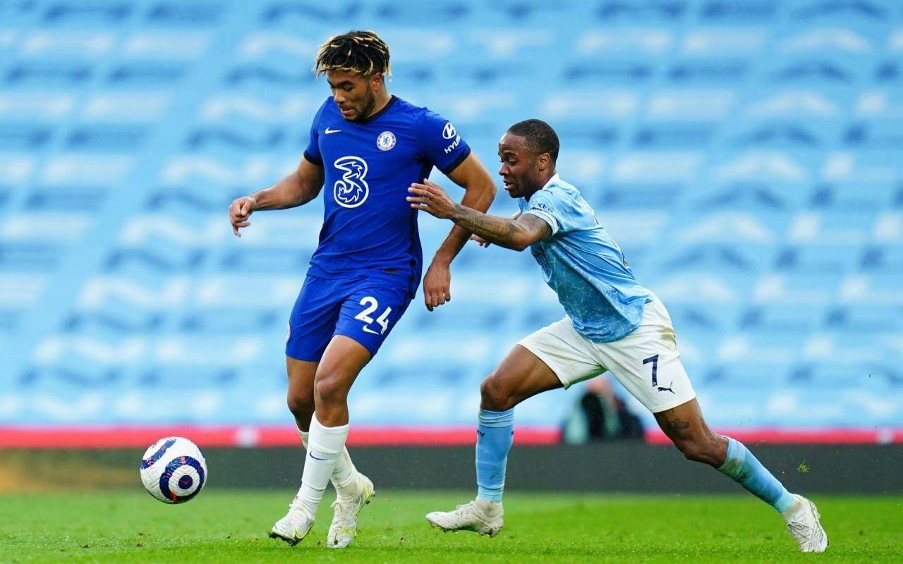 Reece James Kicking Ball Empty Seats