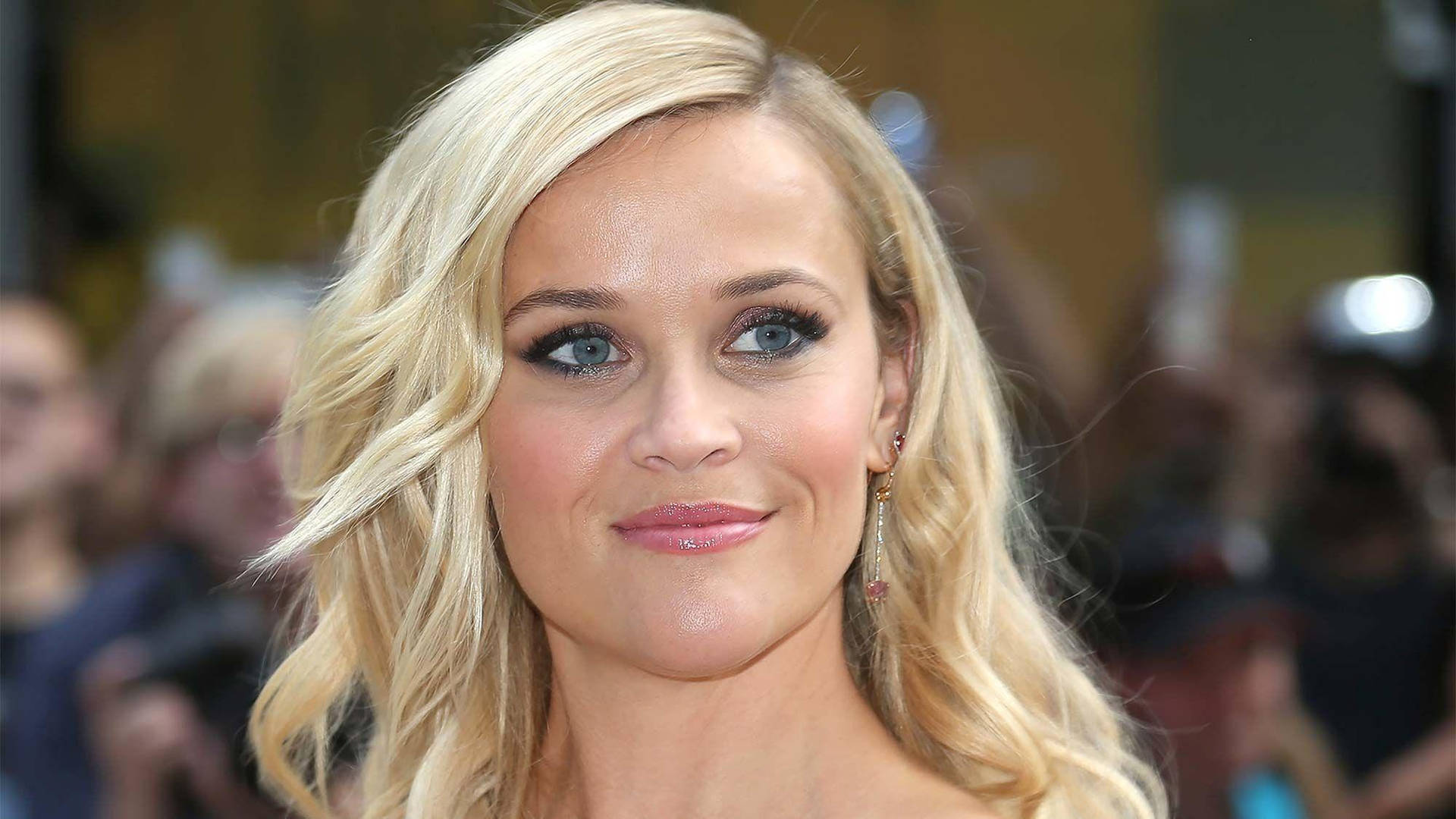 Reese Witherspoon With Press Background
