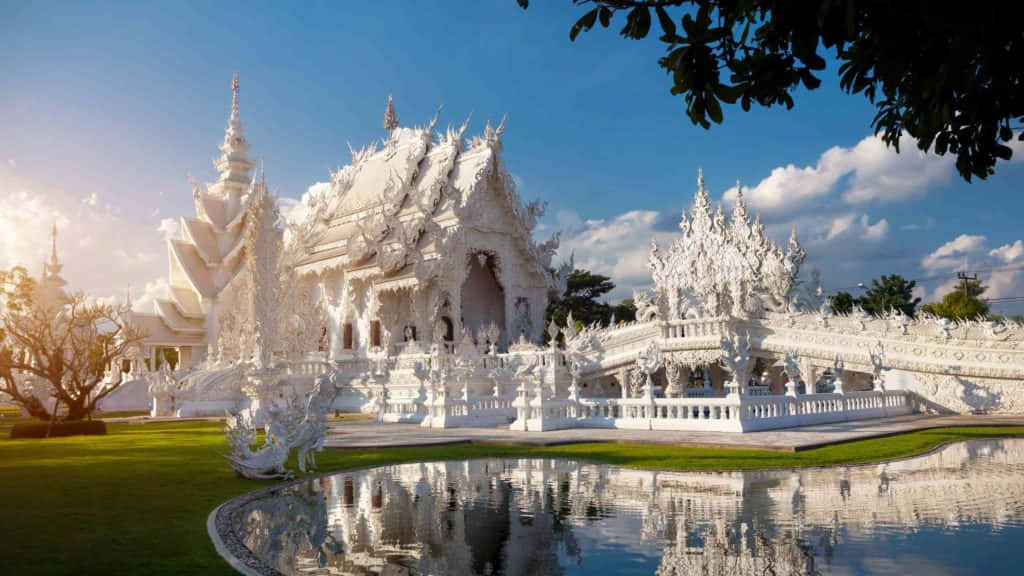 Reflection In Front Of White Temple In Chiang Rai Background