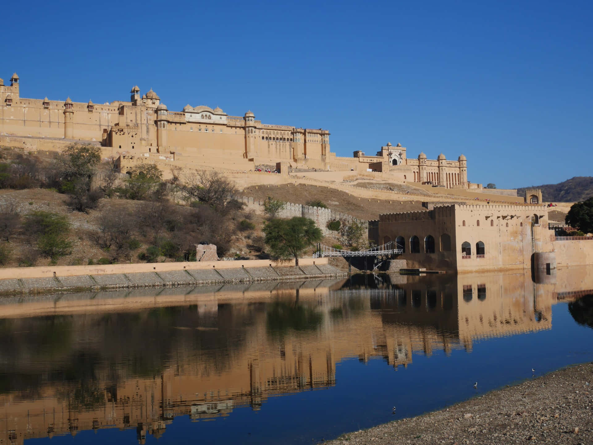 Reflection Of Amer Fort Buildings To The Lake