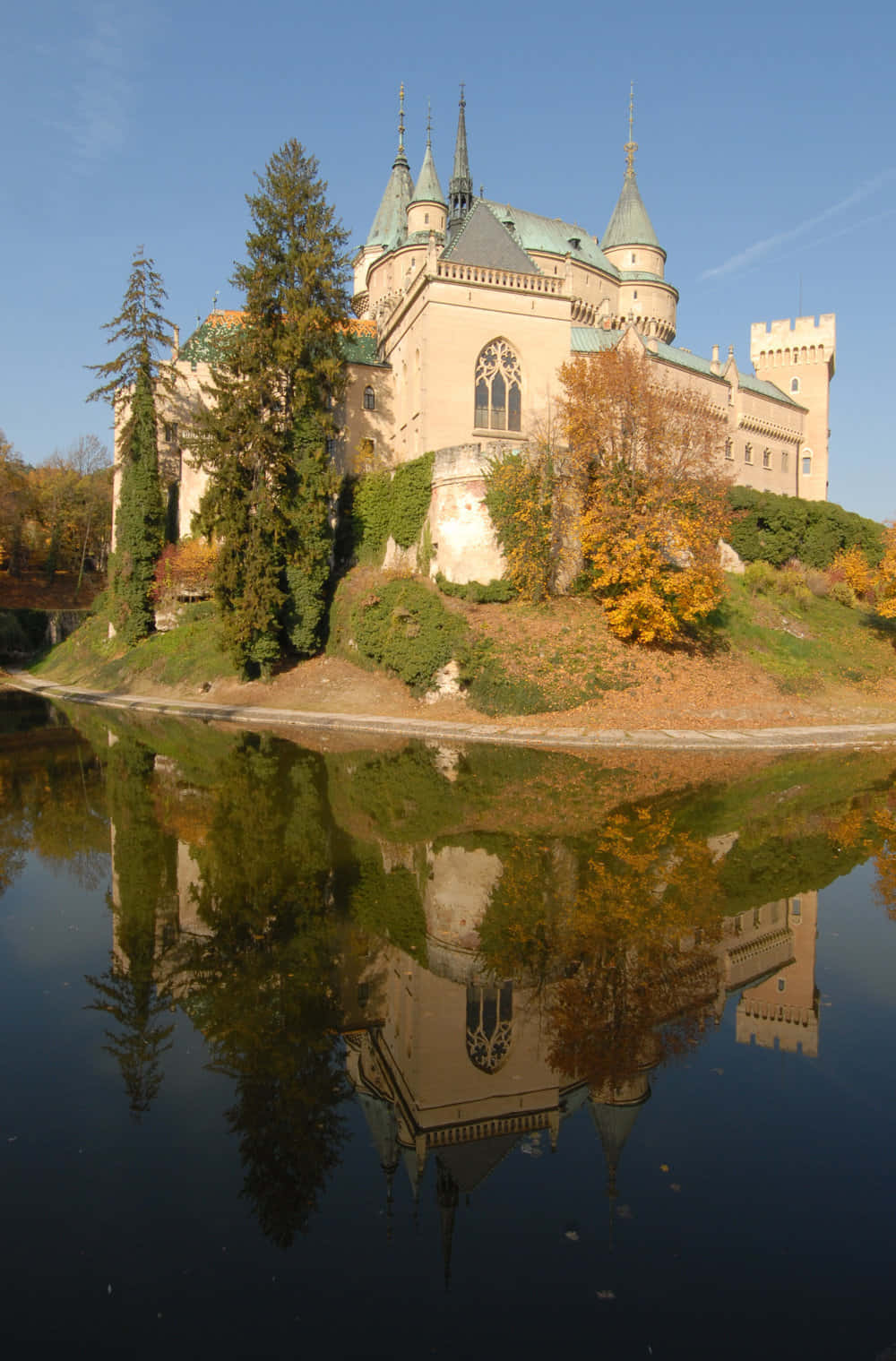 Reflection Of Bojnice Castle In Water Background