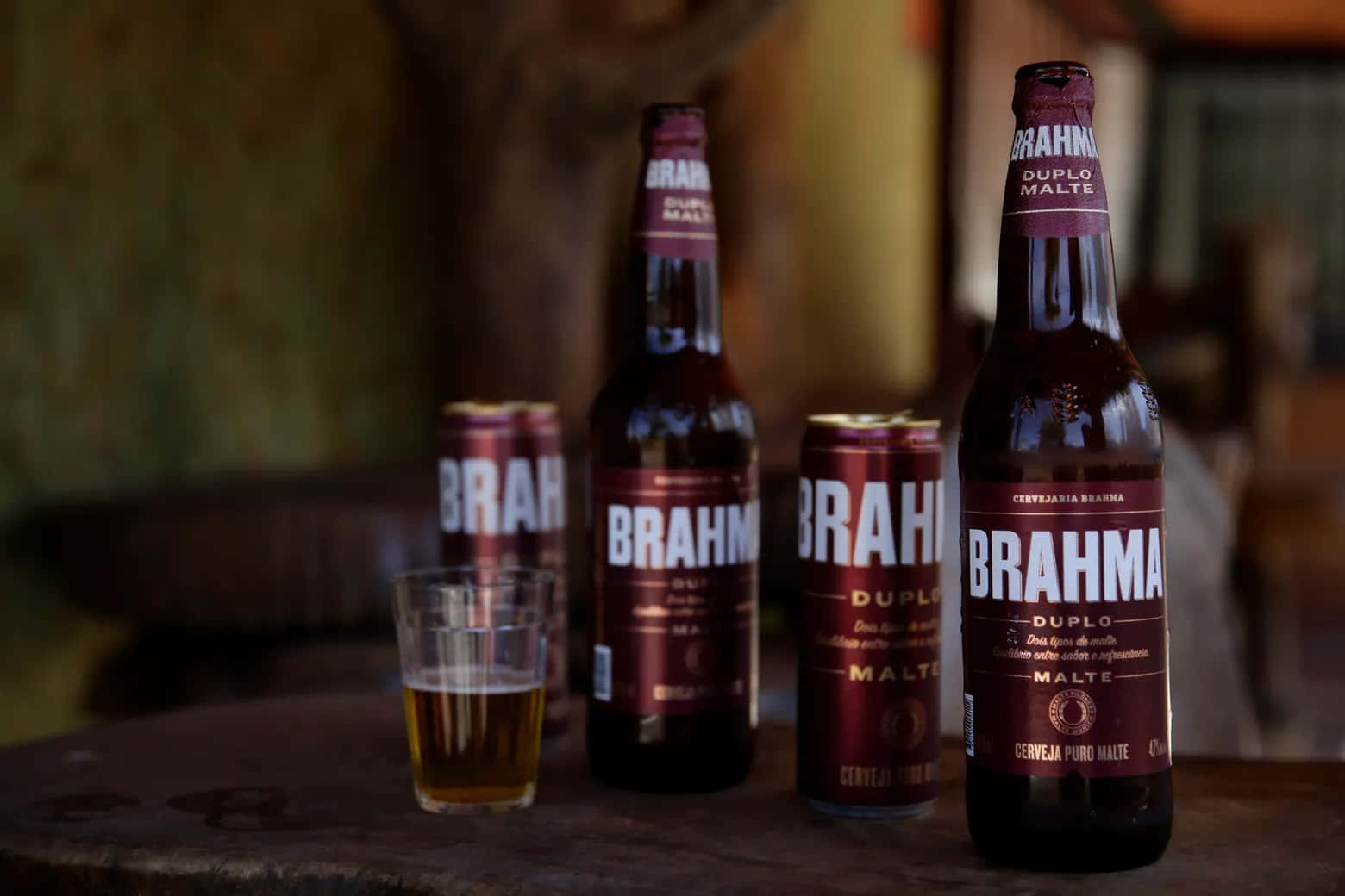 Refreshing Brazilian Brahma Duplo Malte Beer On A Wooden Counter Background