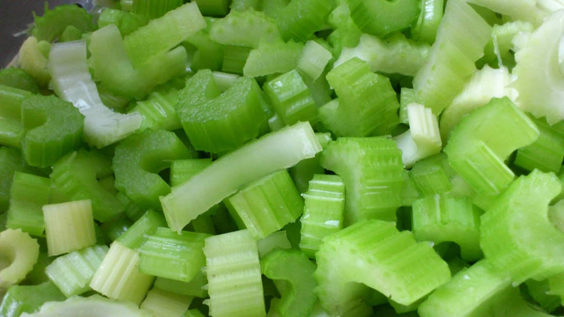 Refreshing Chopped Celery Sticks Background