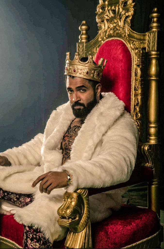 Regal Arun Vijay Seated On Throne Background