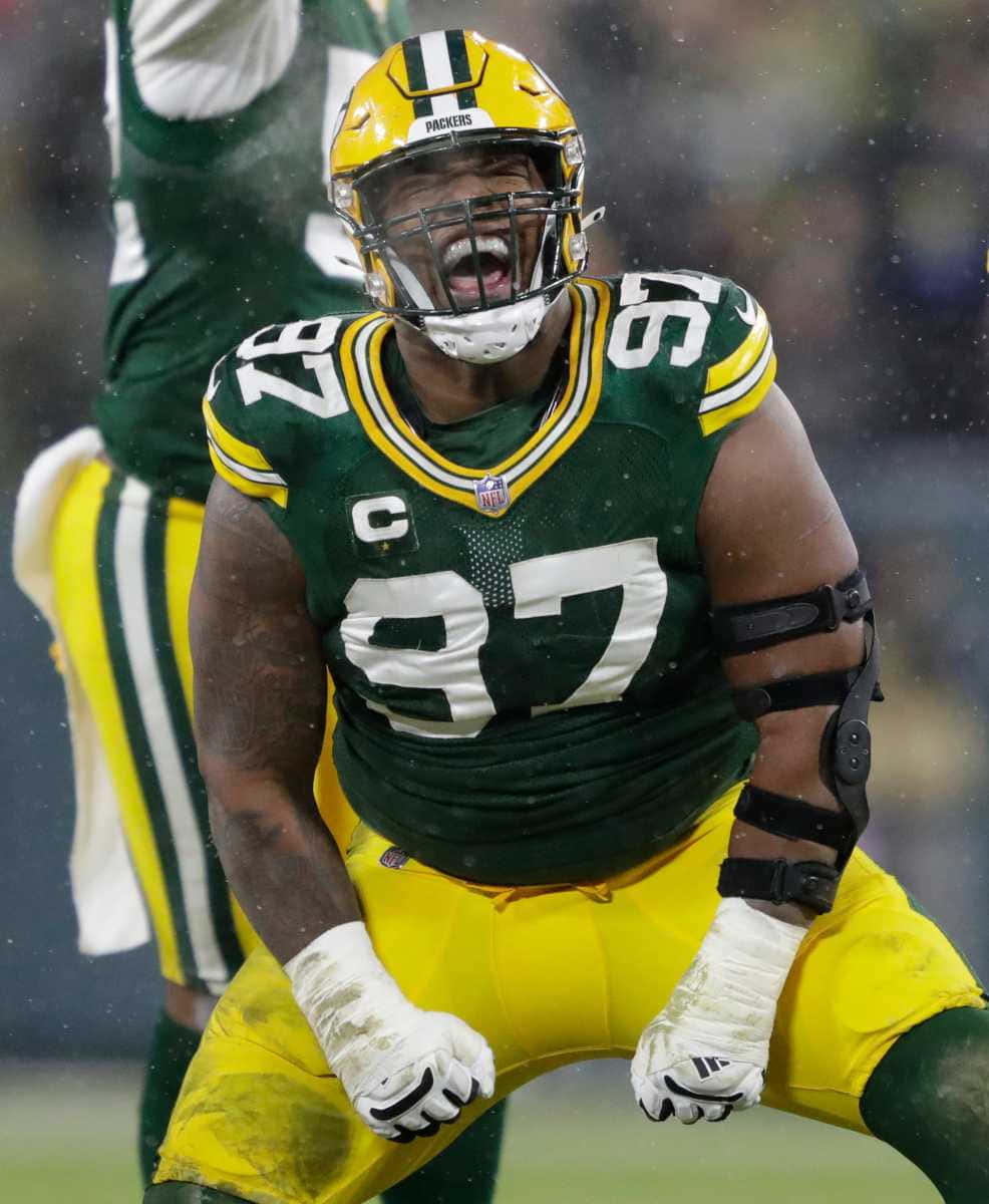 Rejoicing American Football Defensive Tackle Kenny Clark Background
