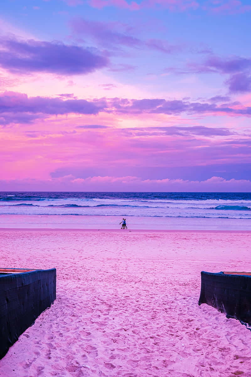 Relax In The Tranquility Of A Pink Beach. Background