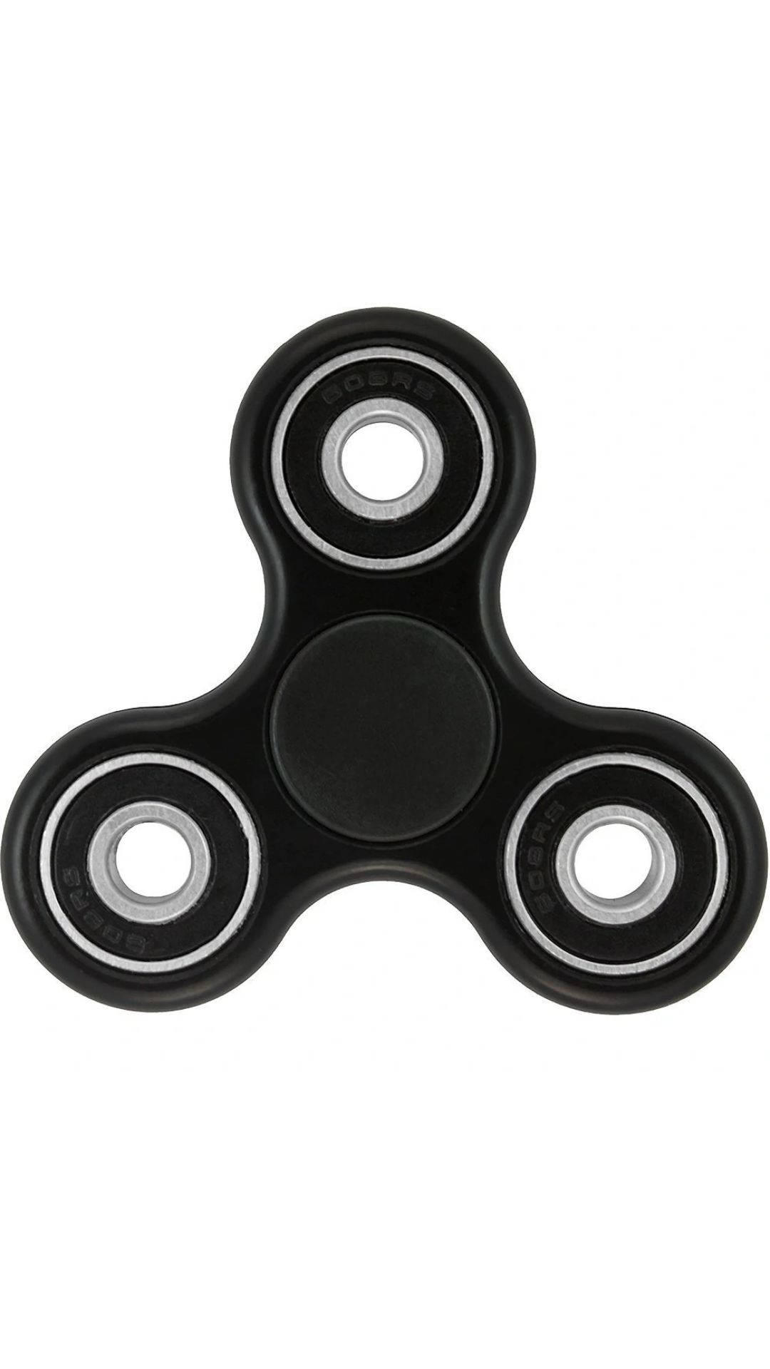 Relaxing With A Black Fidget Toy Background