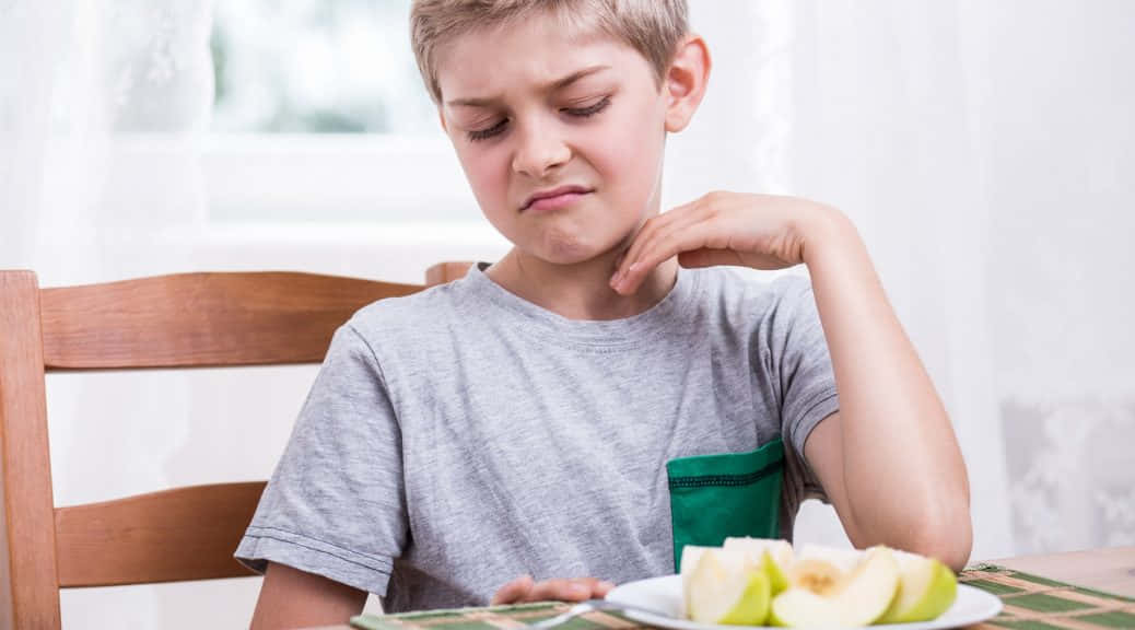 Reluctant Boy And Apples Background