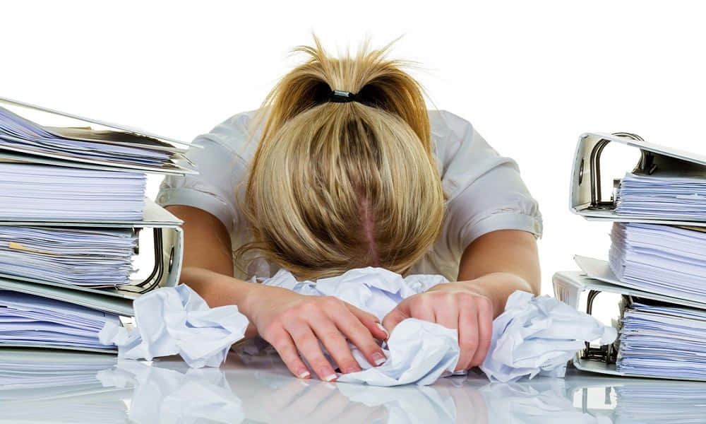 Reluctant Woman With Paperwork Background