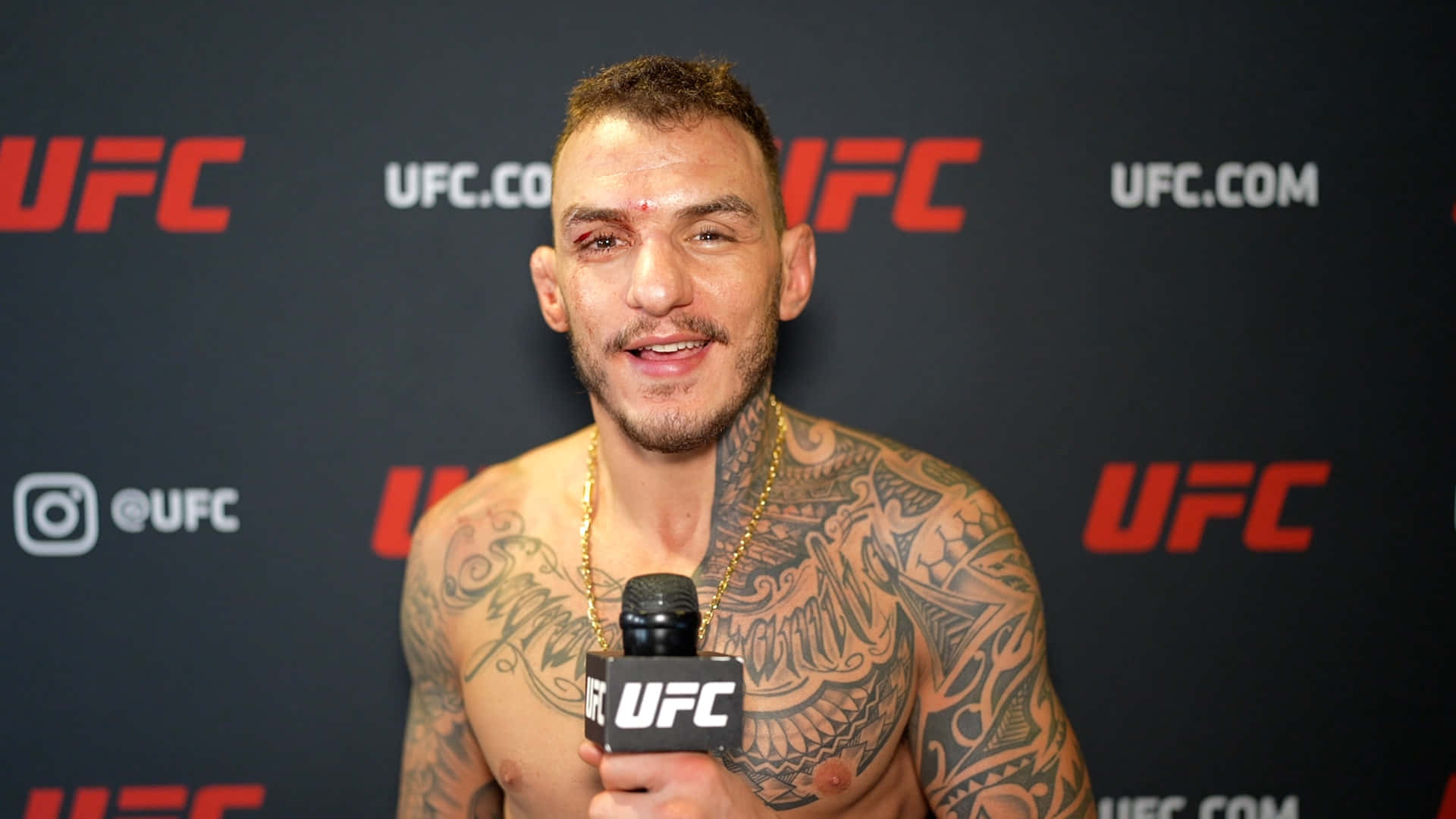 Renato Moicano In A Candid Interview Moment Background