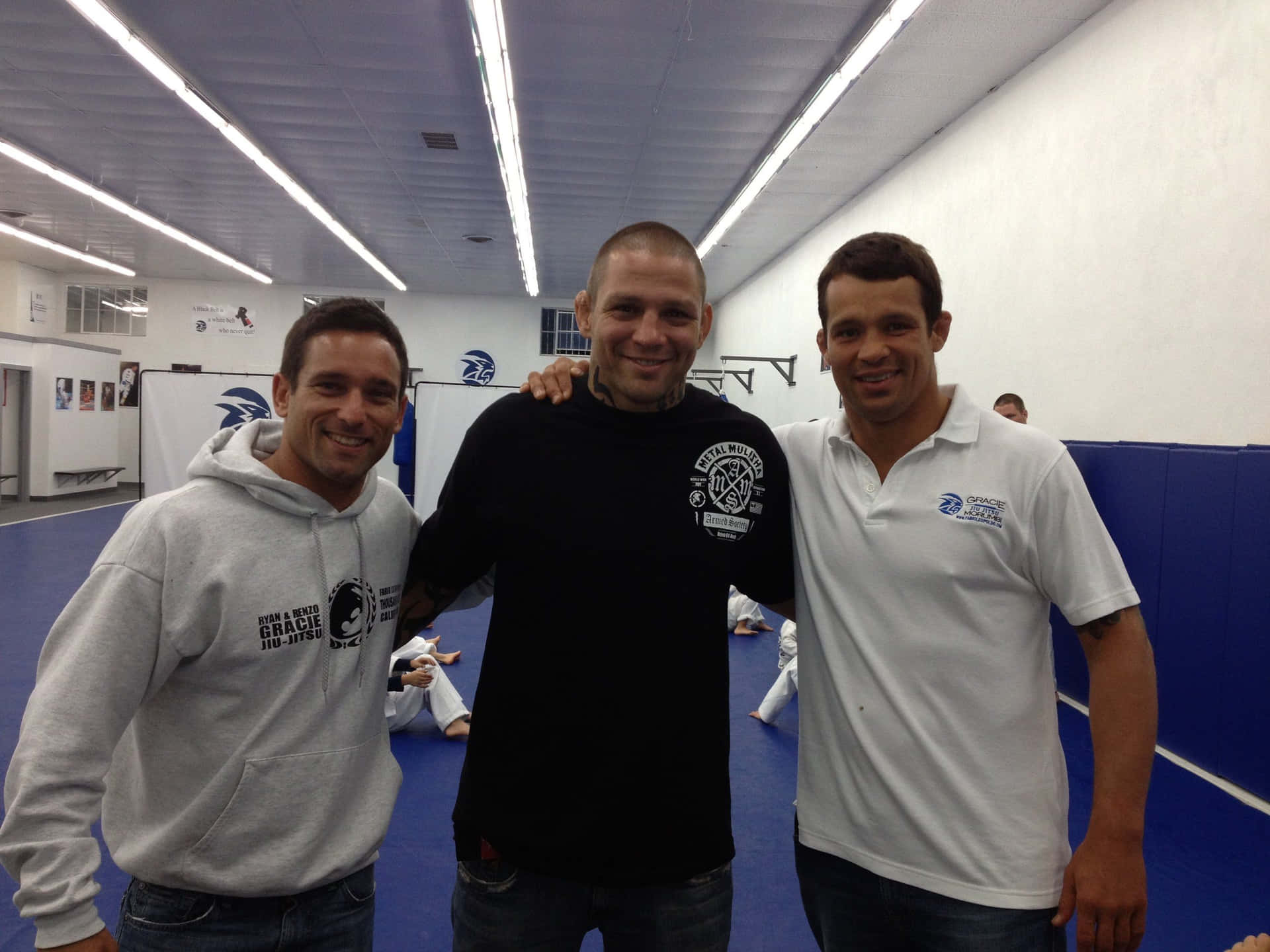 Renato Sobral With Friendsat Gym Background