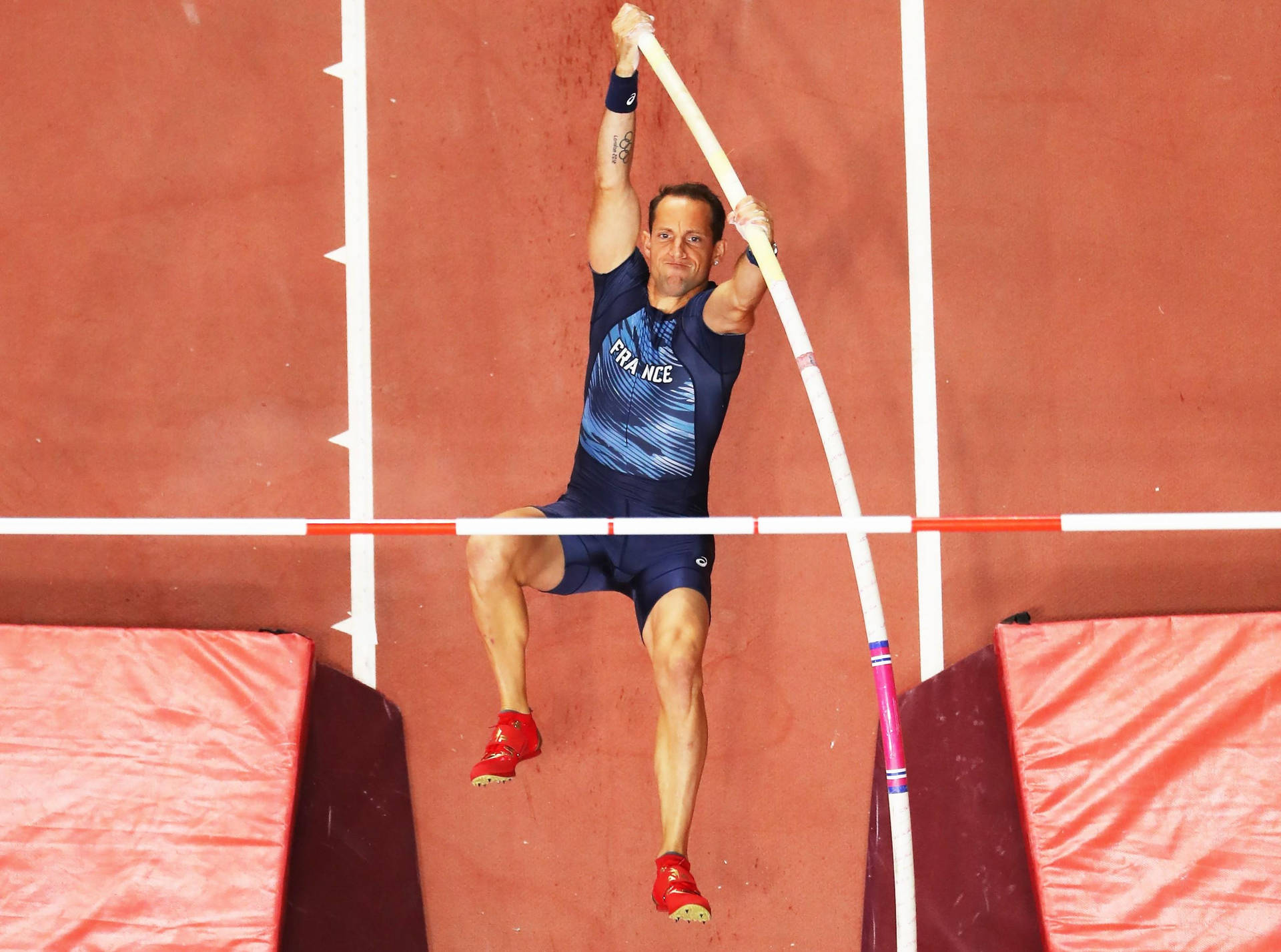 Renaud Lavillenie, French Pole Vault Athlete In Action Background