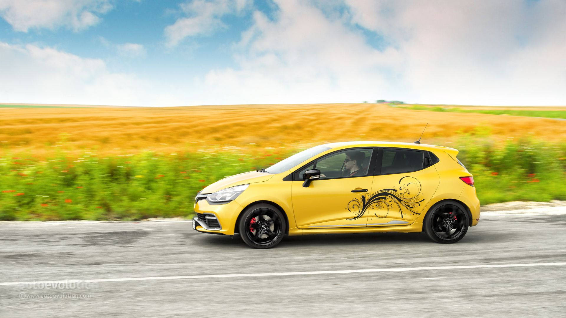Renault In Yellow Fields Background