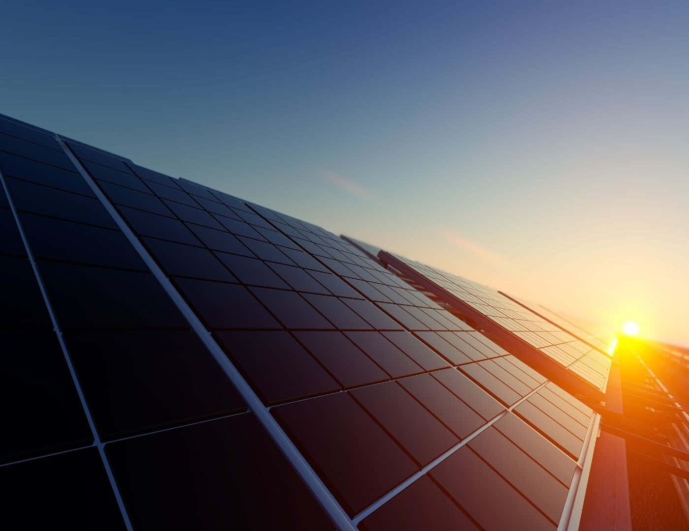 Renewable Energy Solar Panels And Sunset Background