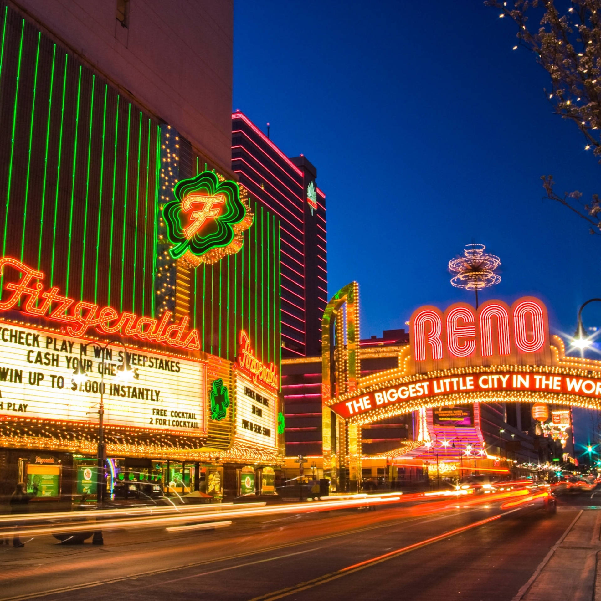 Reno's Vibrant Strip At Night Background
