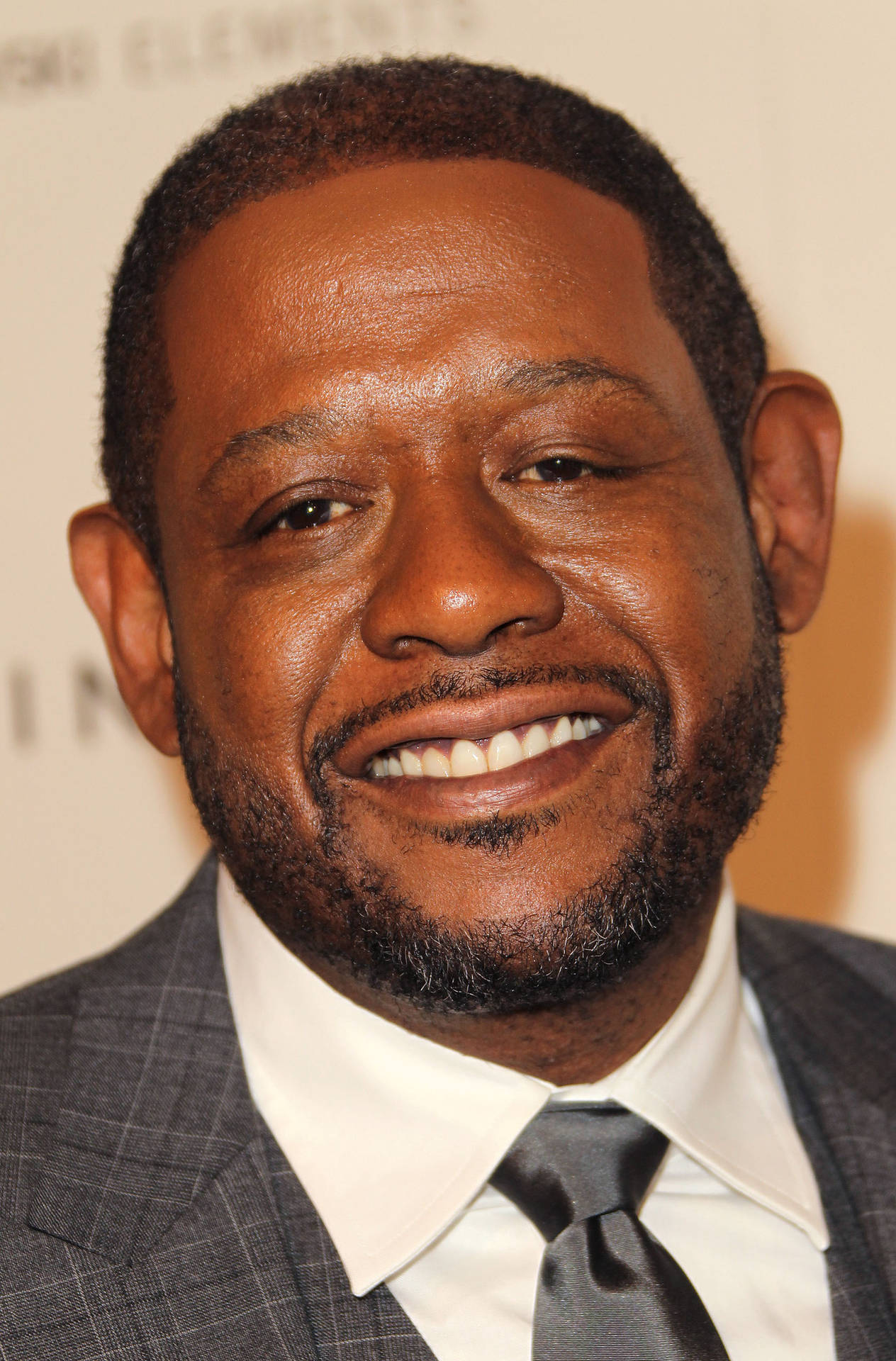 Renowned Actor Forest Whitaker In Elegant Grey Plaid Suit