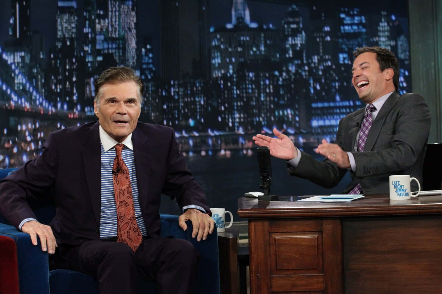 Renowned Actor, Fred Willard, Expressing An Engaging Gesture. Background