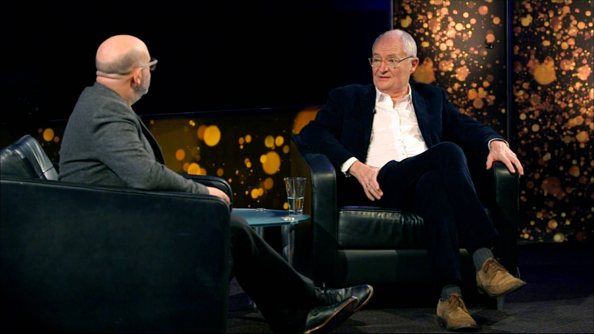 Renowned Actor Jim Broadbent During Television Interview Background