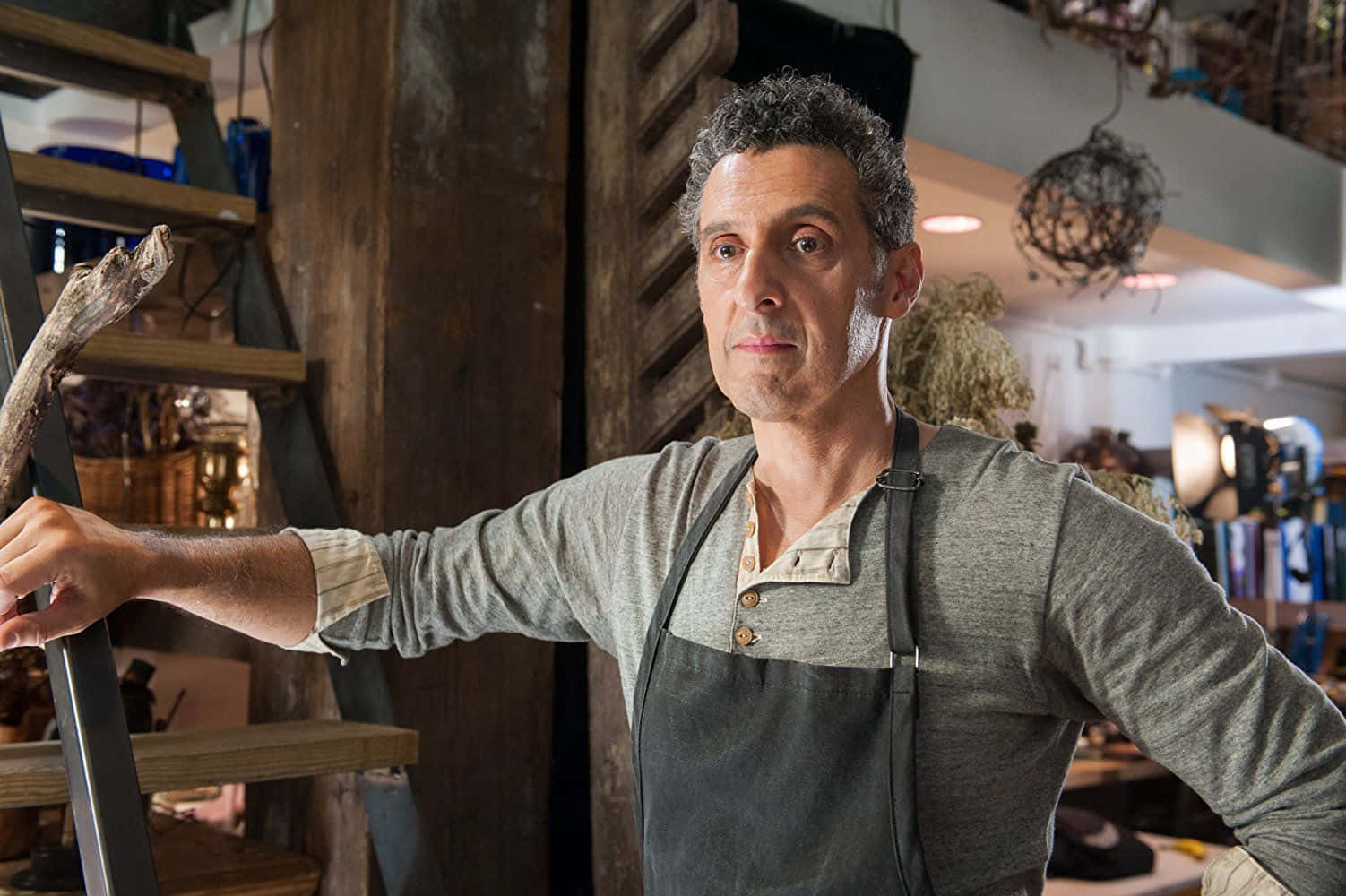 Renowned Actor, John Turturro, In Thoughtful Pose Background