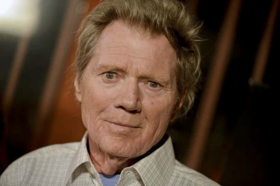 Renowned Actor Michael Parks In Contemplative Mood Background