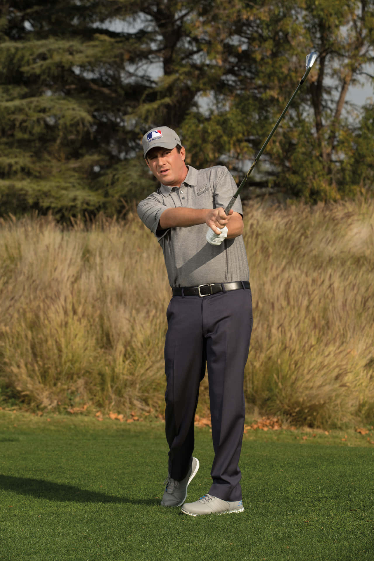 Renowned Golfer Billy Andrade Showcasing His Perfect Swing Background