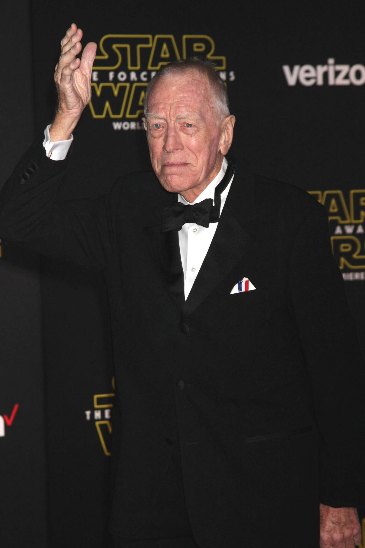 Renowned Swedish Actor, Max Von Sydow, Waving In Style Background