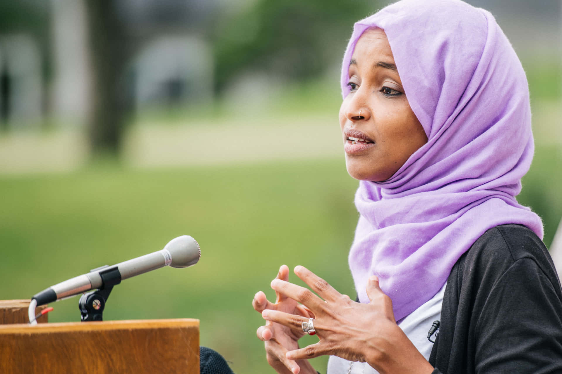 Rep. Ilhan Omar Giving An Inspiring Speech Background